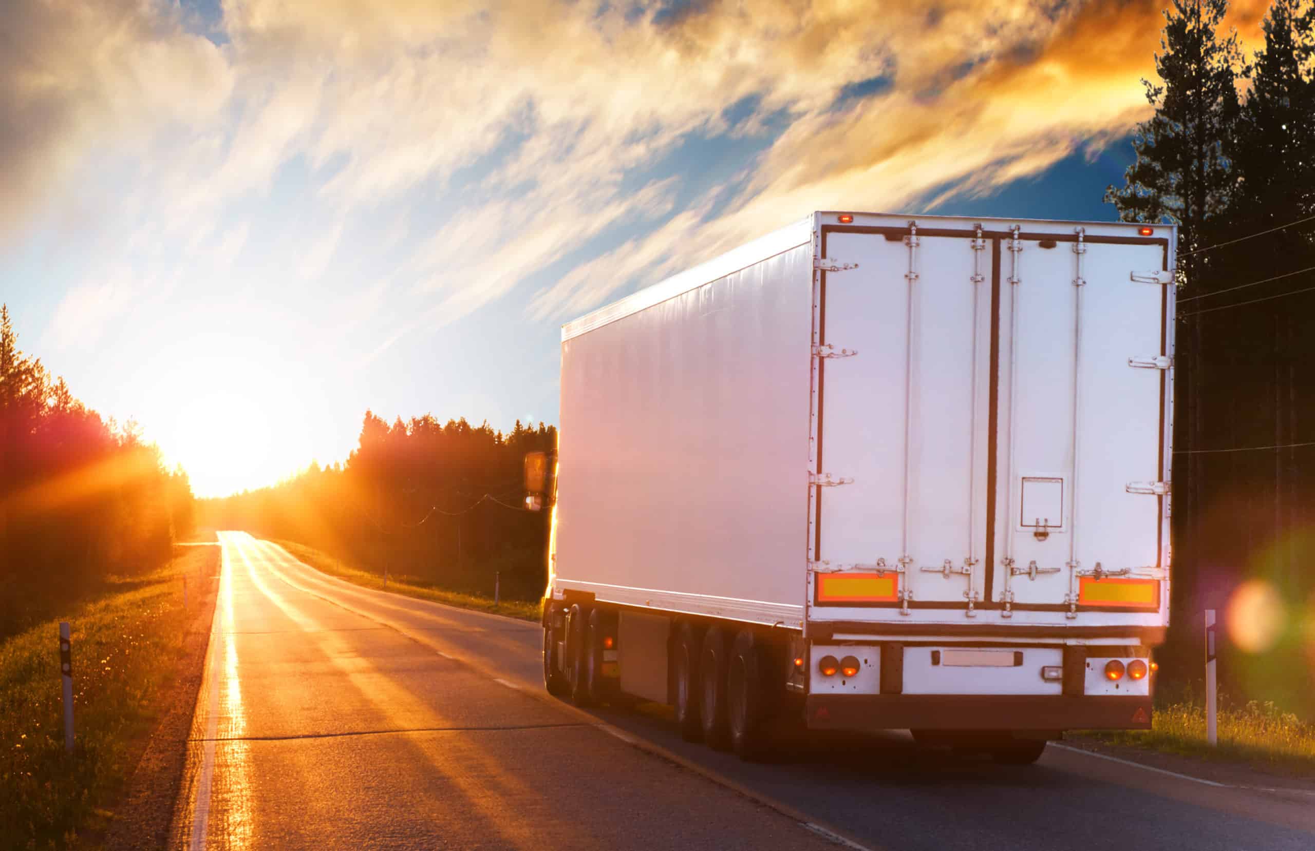 Truck On The Asphalt Road In The Evening